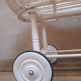 Wicker and painted wood baby cradle
