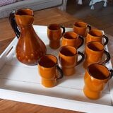 Old service 1 pitcher and 8 mugs/cups