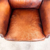 Vintage sheep leather wingback armchair Goor