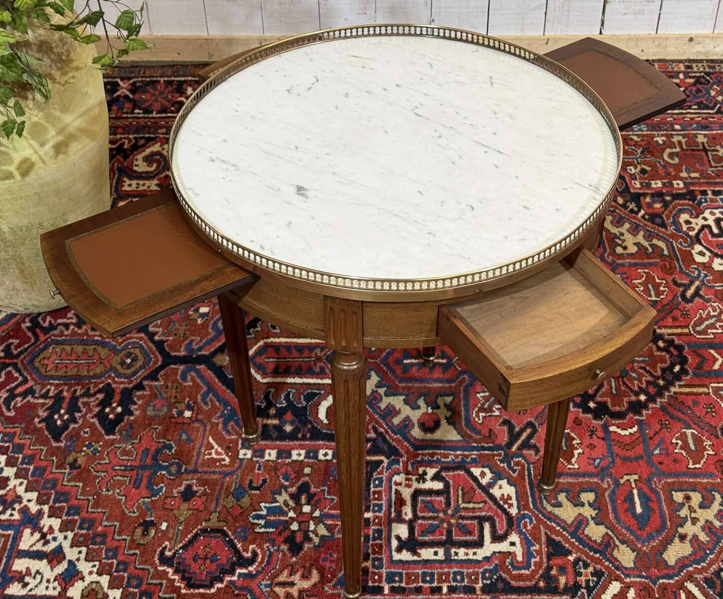Louis XVI style bouillotte table from the 1960s in mahogany with a marble top.