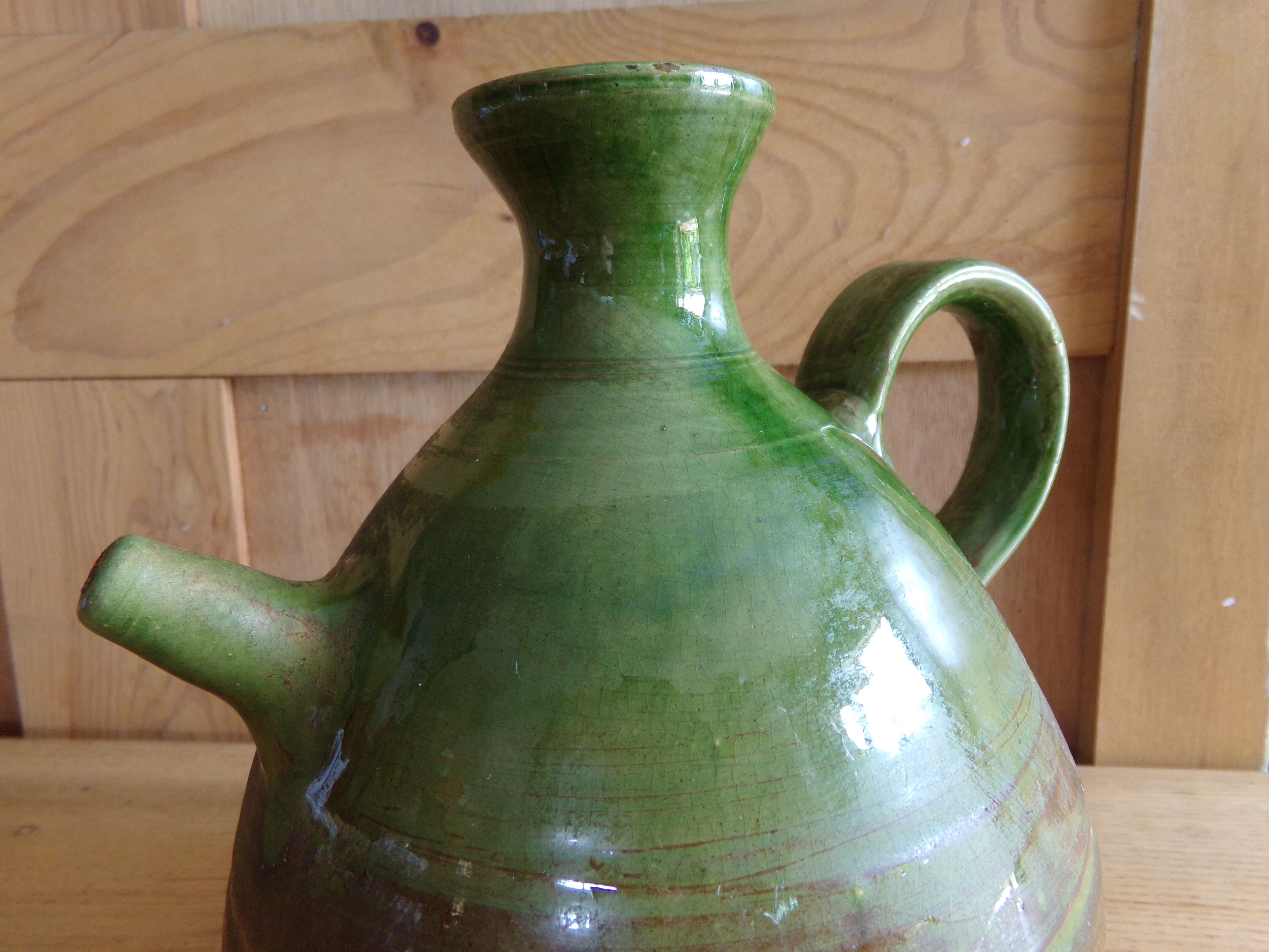 Enamelled terracotta jug