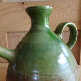Enamelled terracotta jug