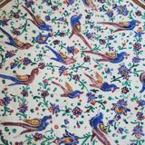 Plate and two decorative saucers enamelled with Persia decoration, circa 1940