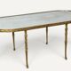 Maison Baguès coffee table in gilded bronze and aged mirror – 1950s
