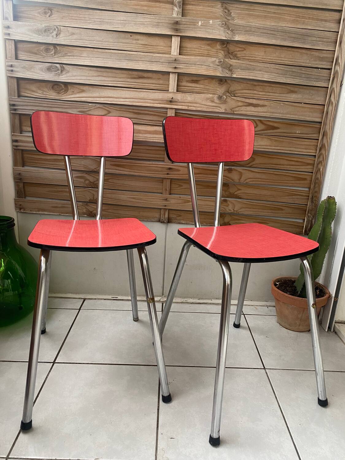Pair of raspberry formica chairs