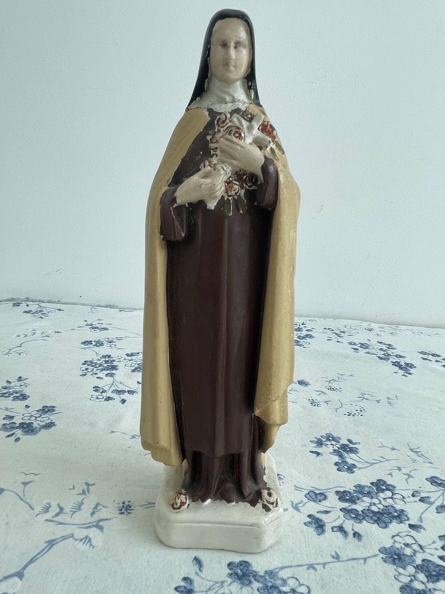 Antique statue of Saint Therese of Lisieux, religious plaster figurine