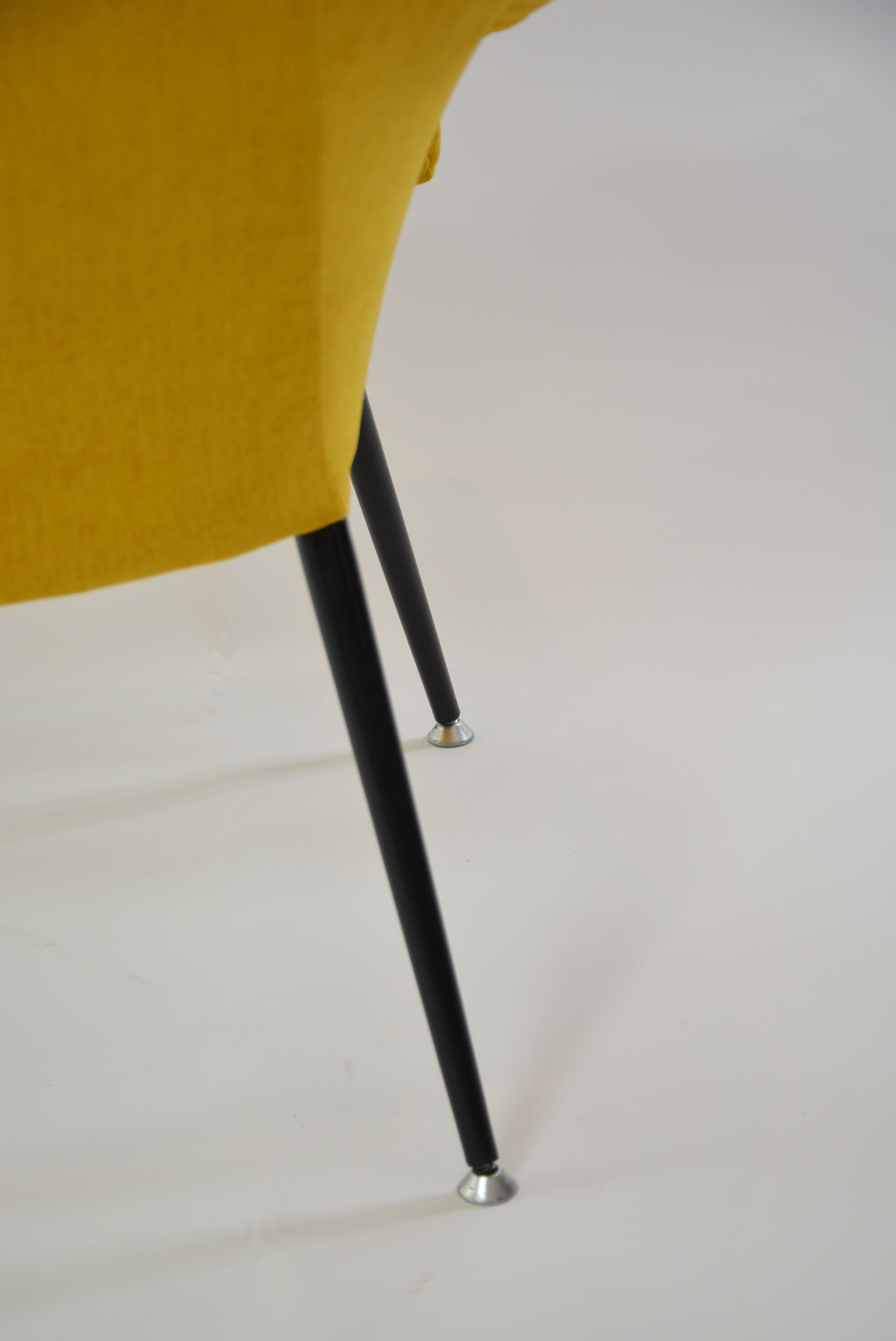 Yellow shell armchair