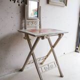 Small antique folding wooden dressing table with tiles and a mercury mirror.