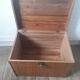 Wooden trunk with braiding