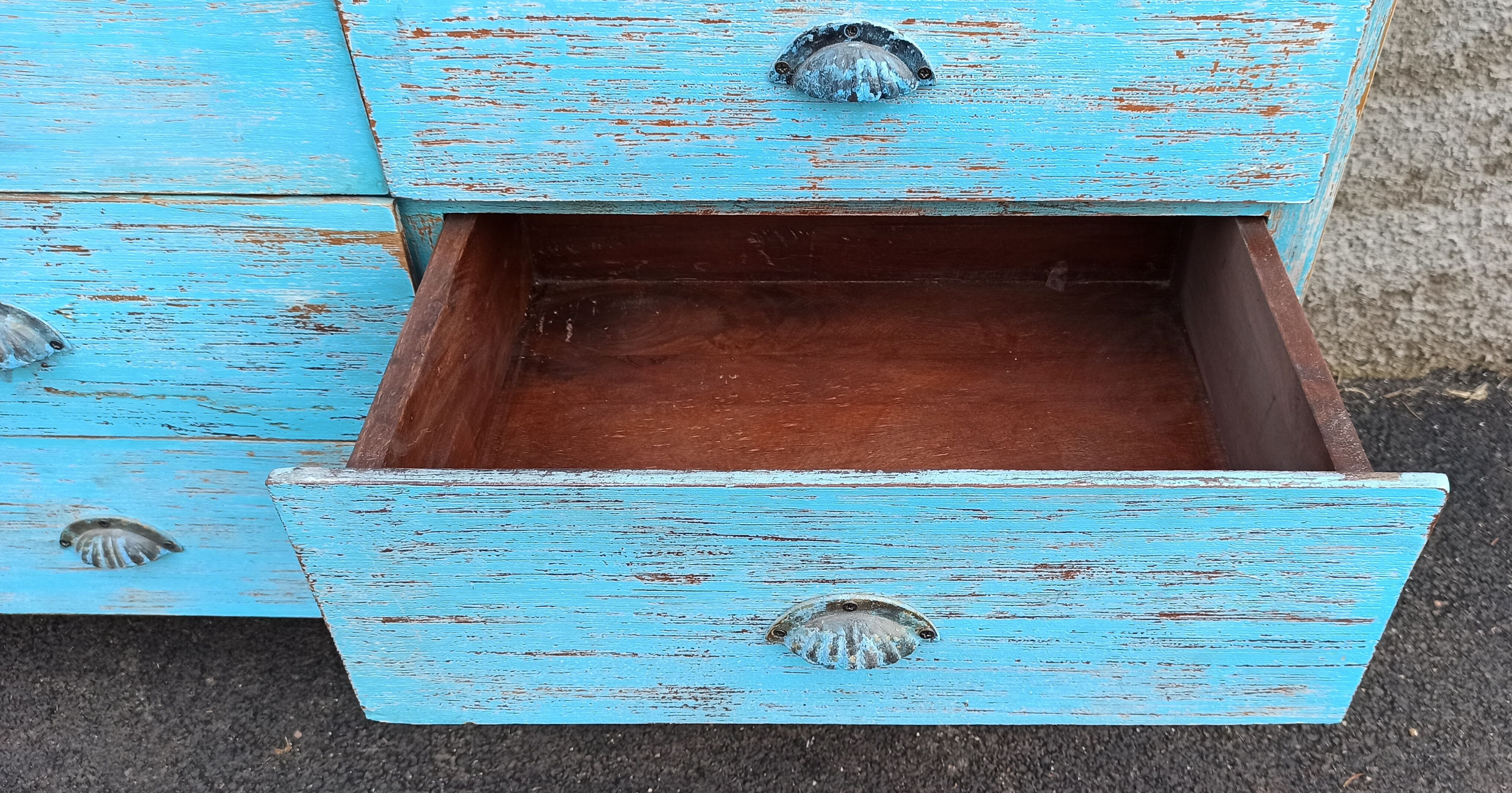 Blue wooden dresser with drawers