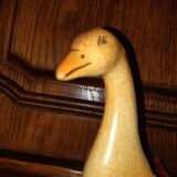 Old saltron painted in ceramic in the shape of a swan