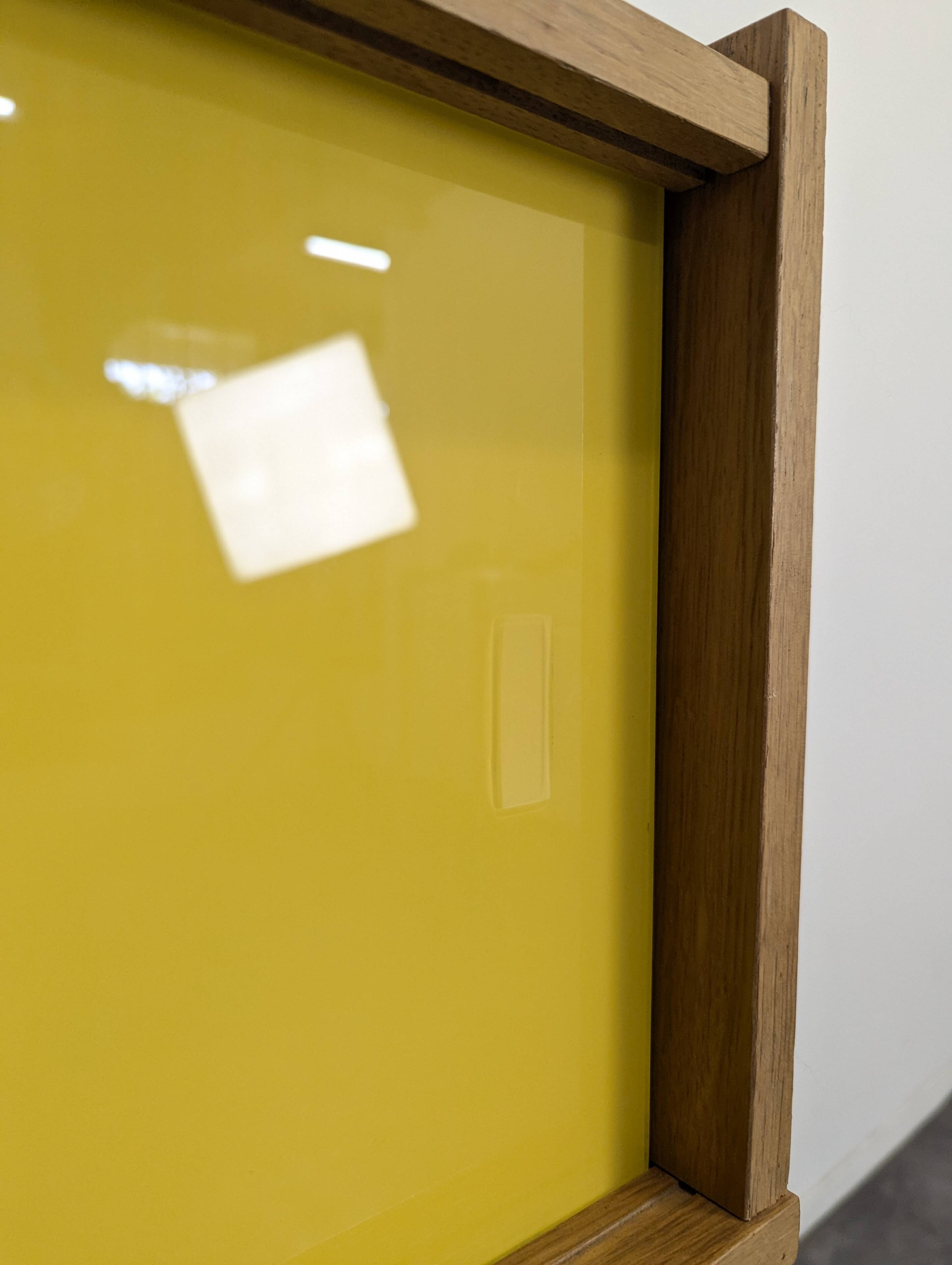 Modernist sideboard with glass doors in grey and yellow oak veneer.