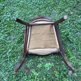 Old wooden chair with upholstered seat