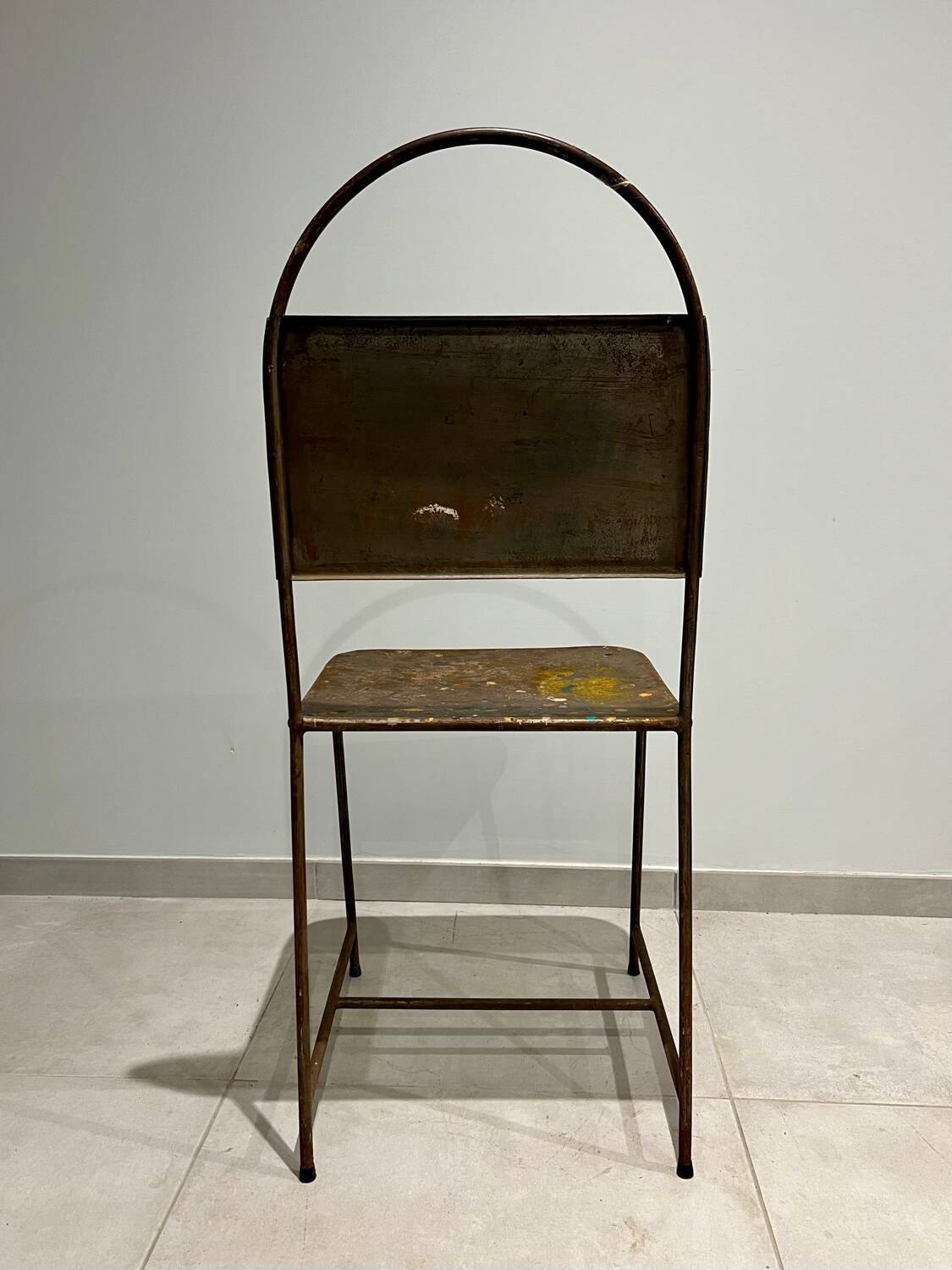 Pair of vintage raw metal chairs