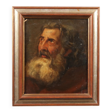 Old painting of a male face in oil on cardboard from the 19th century.