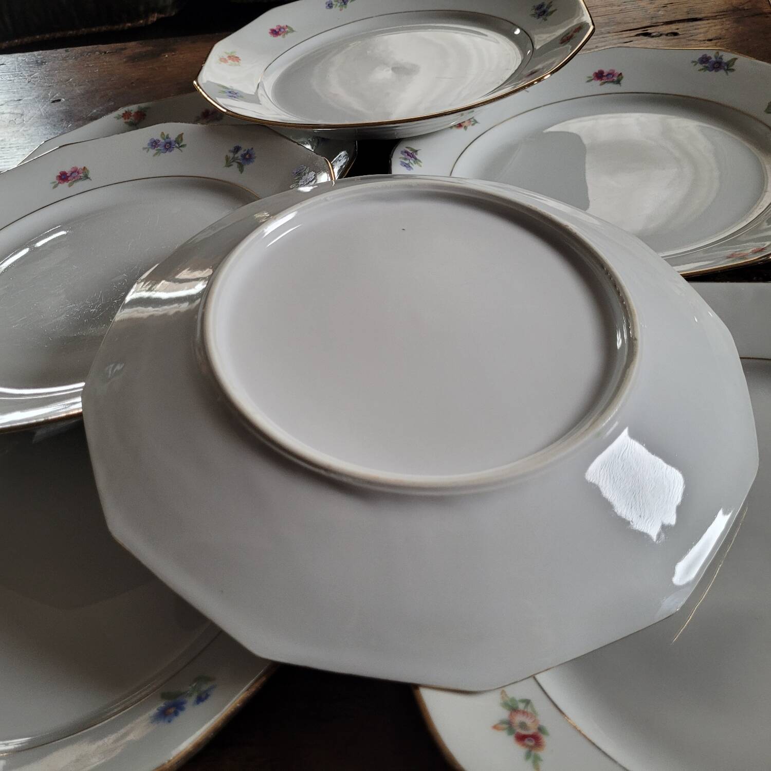 Set of 8 porcelain plates with twelve cut sides - floral decoration and
