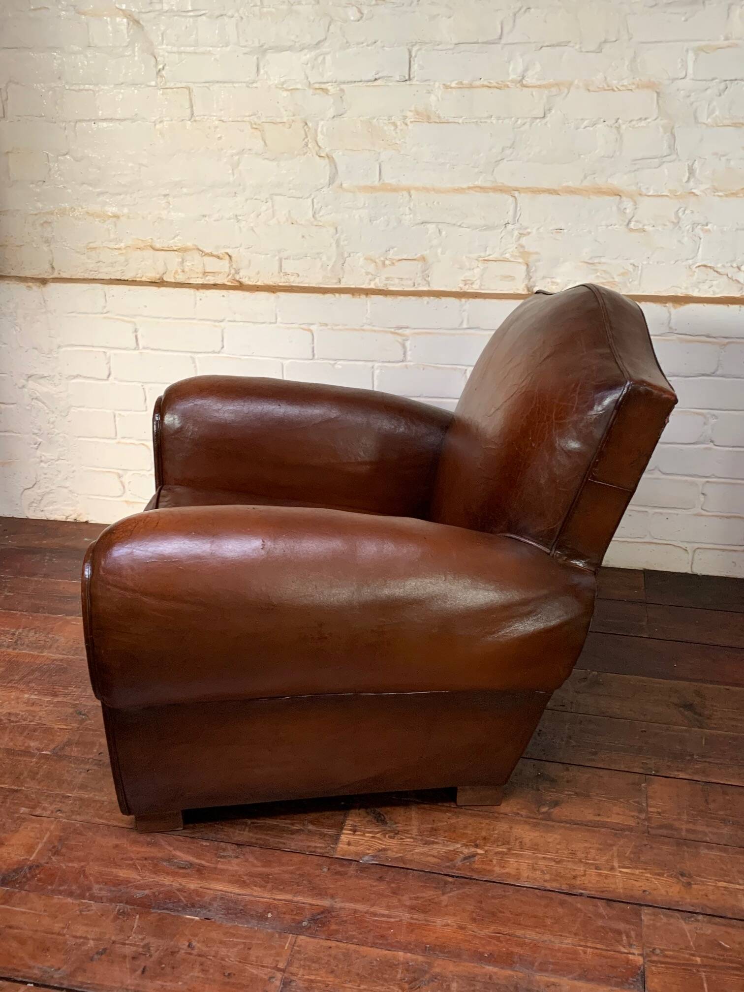 French leather club chair, chapeau de gendarme model circa 1950’s