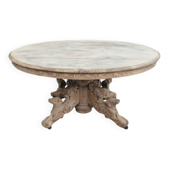 Henry II table in pickled oak central legs decorated with dogs