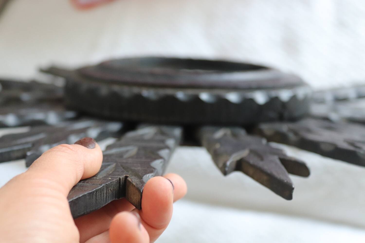 Antique black wooden sun mirror