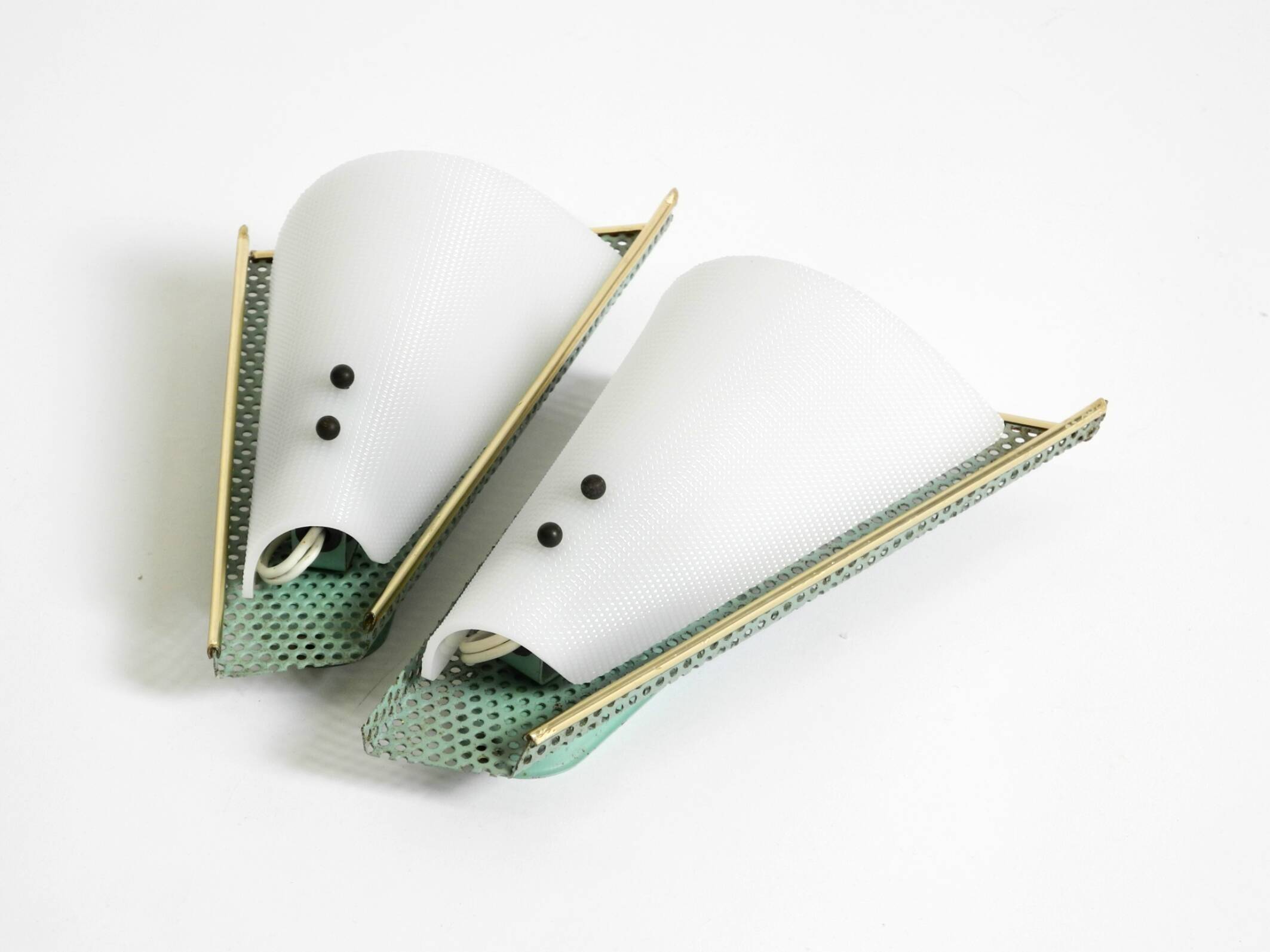 Pair of beautiful mint green Mid Century Modern perforated sheet metal wall