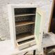 White medicine cabinet with window and drawer