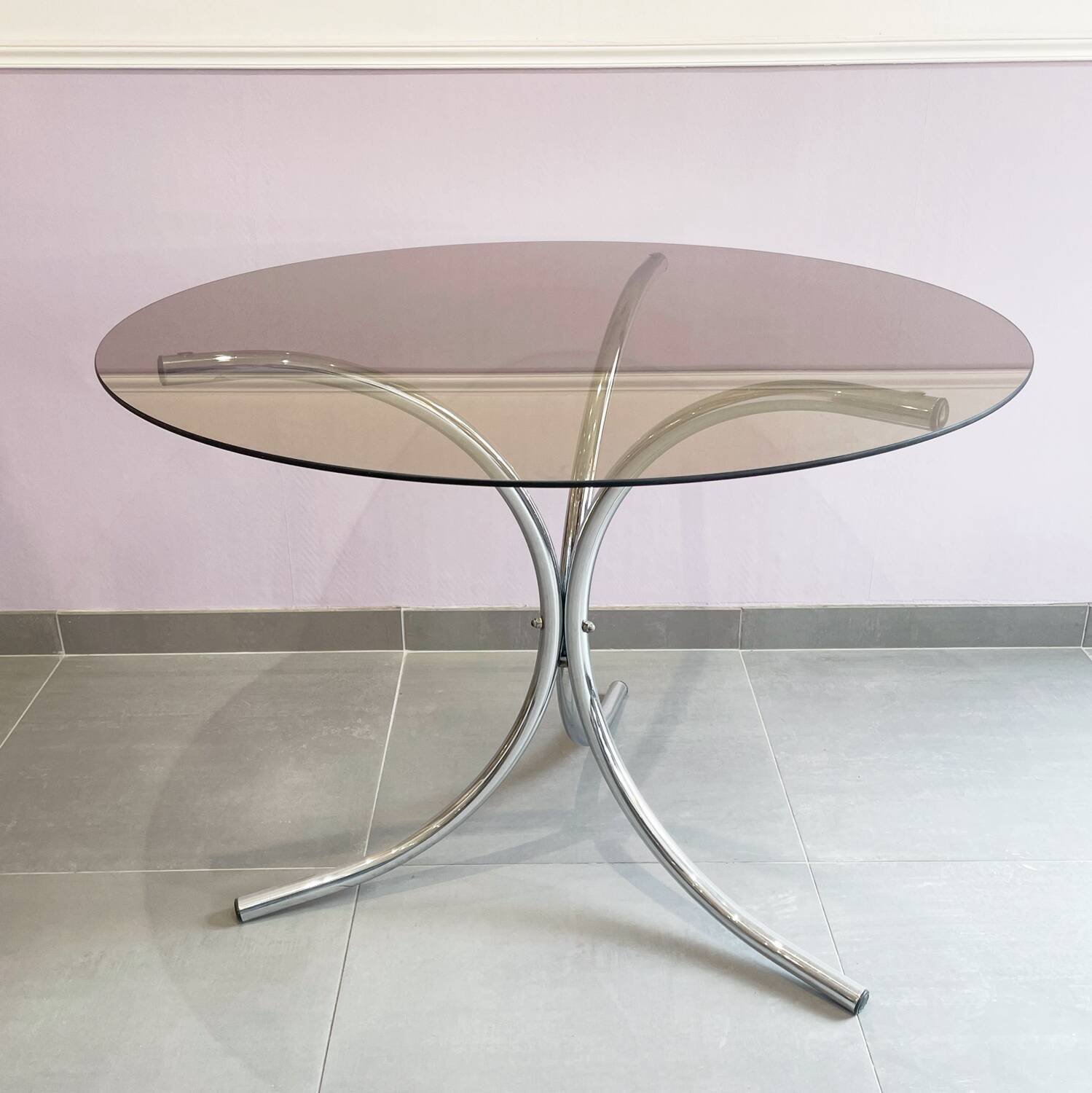 Chromed metal and smoked glass table