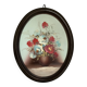 Oval painting of a bouquet of flowers, oil on panel.
