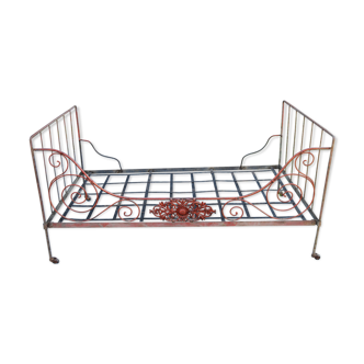 Old wrought iron of the 19 th century folding bed