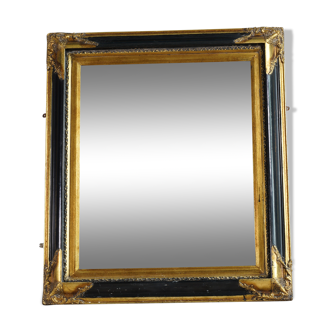 Gilt and black lacquer ornate mirror