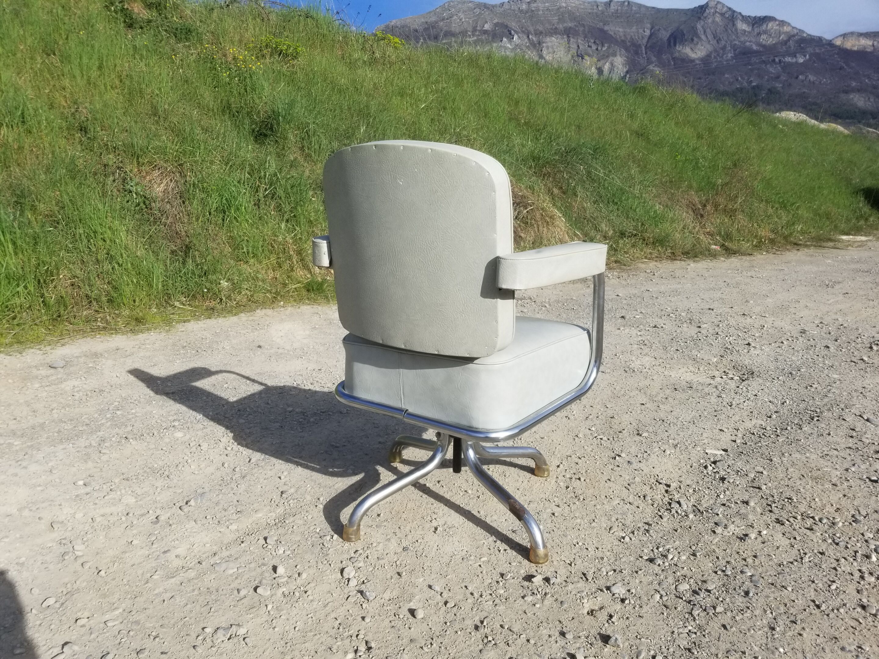 Old light grey pullman swivel office chair