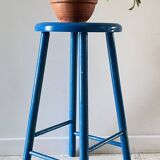 Vintage wooden stool with electric blue paint