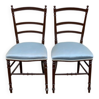 2 Napoleon III chairs in solid wood and blue satin fabric.