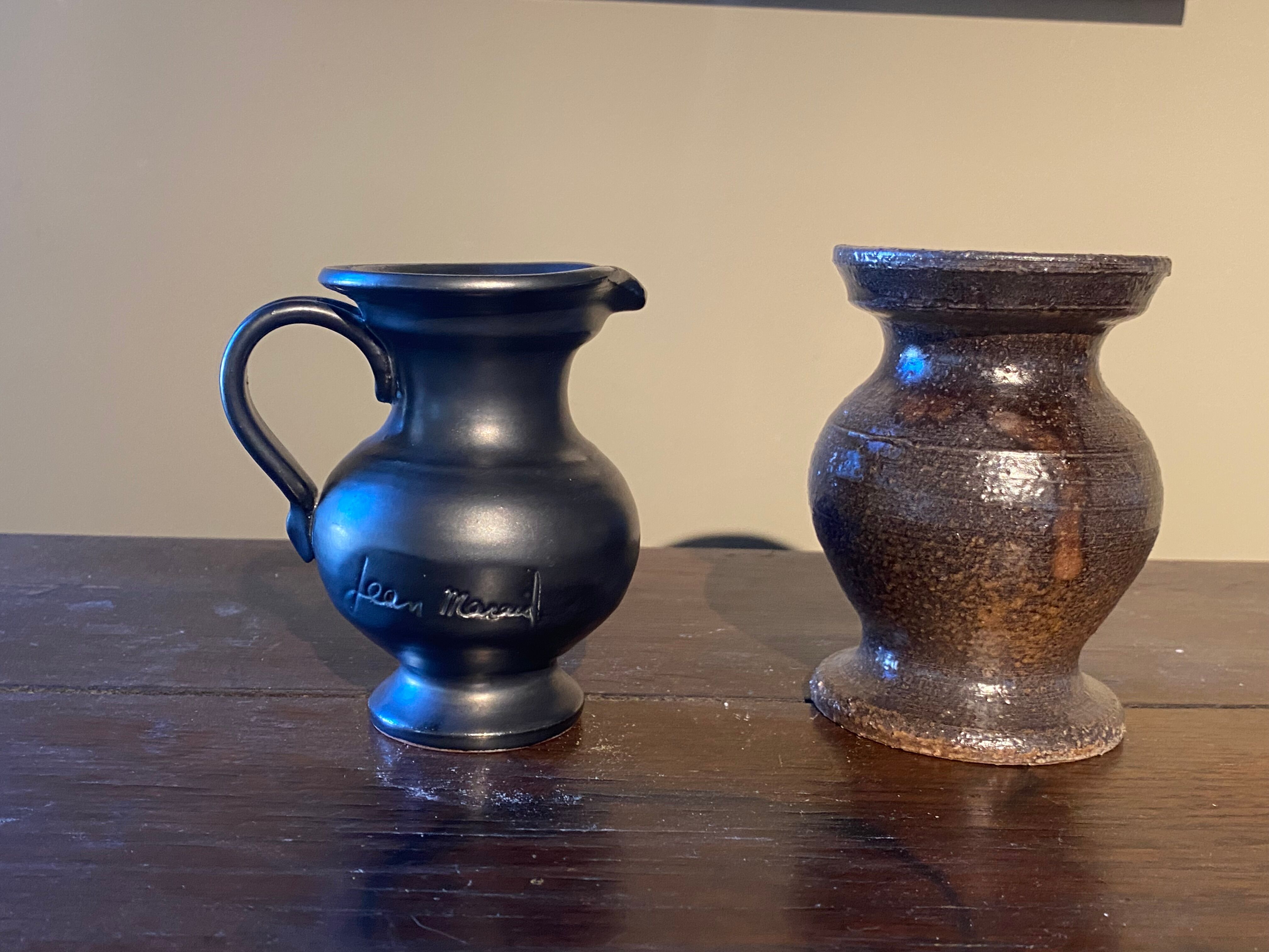 Set of 2 Jean Marais ceramic pitchers
