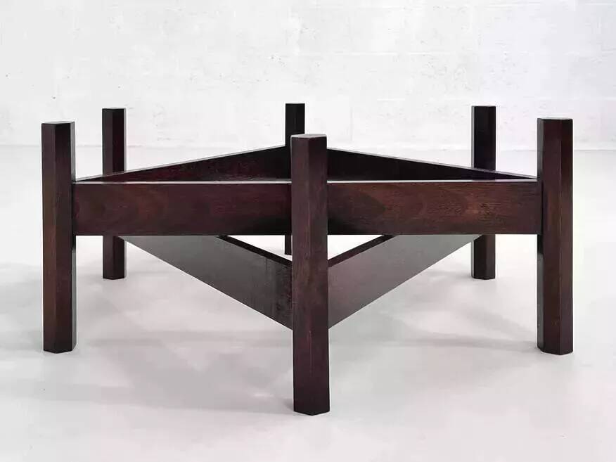 Wooden coffee table with round smoked glass top