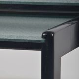 Tables gigognes en bois teinté noir et plateau en verre, années 1960