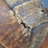 Mid-20th century leather soccer ball with visible stitching and beautiful patina