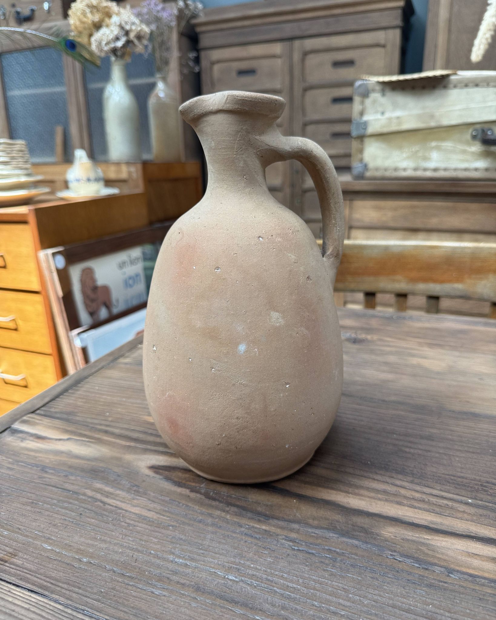 Unfired clay pitcher