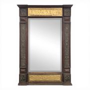 Renaissance-style mirror in wood and copper with a craftsmanship theme.