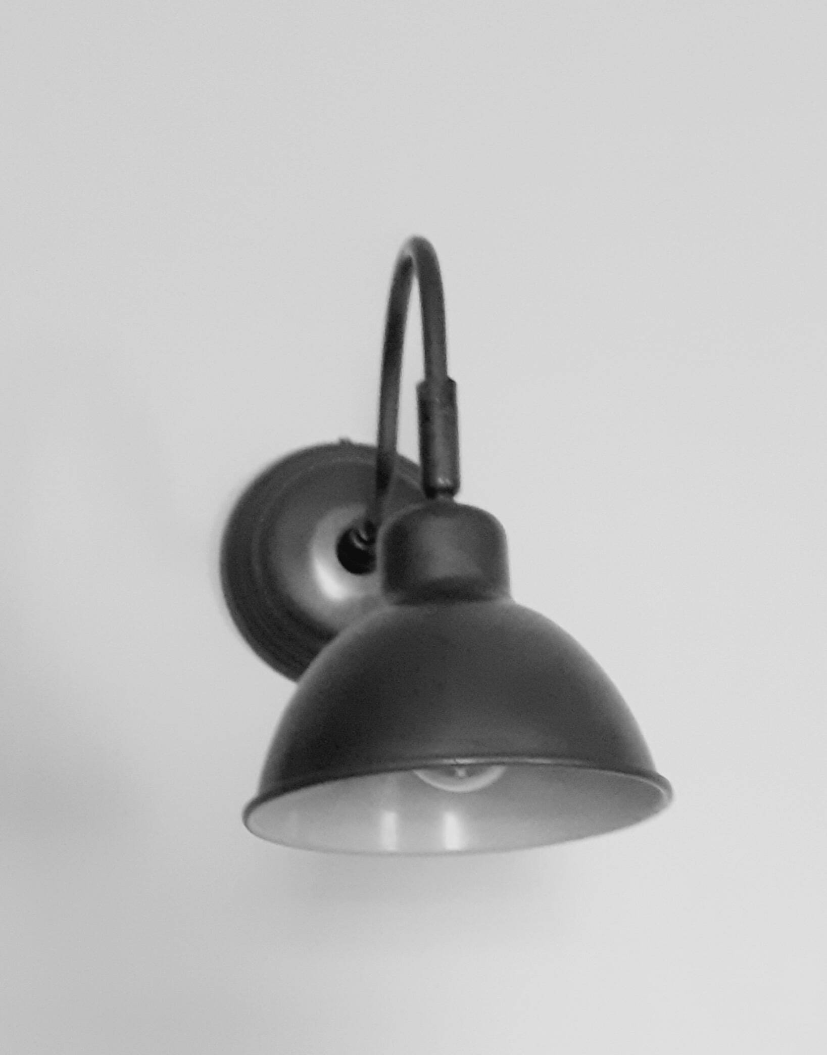 Metal wall lamp in industrial style