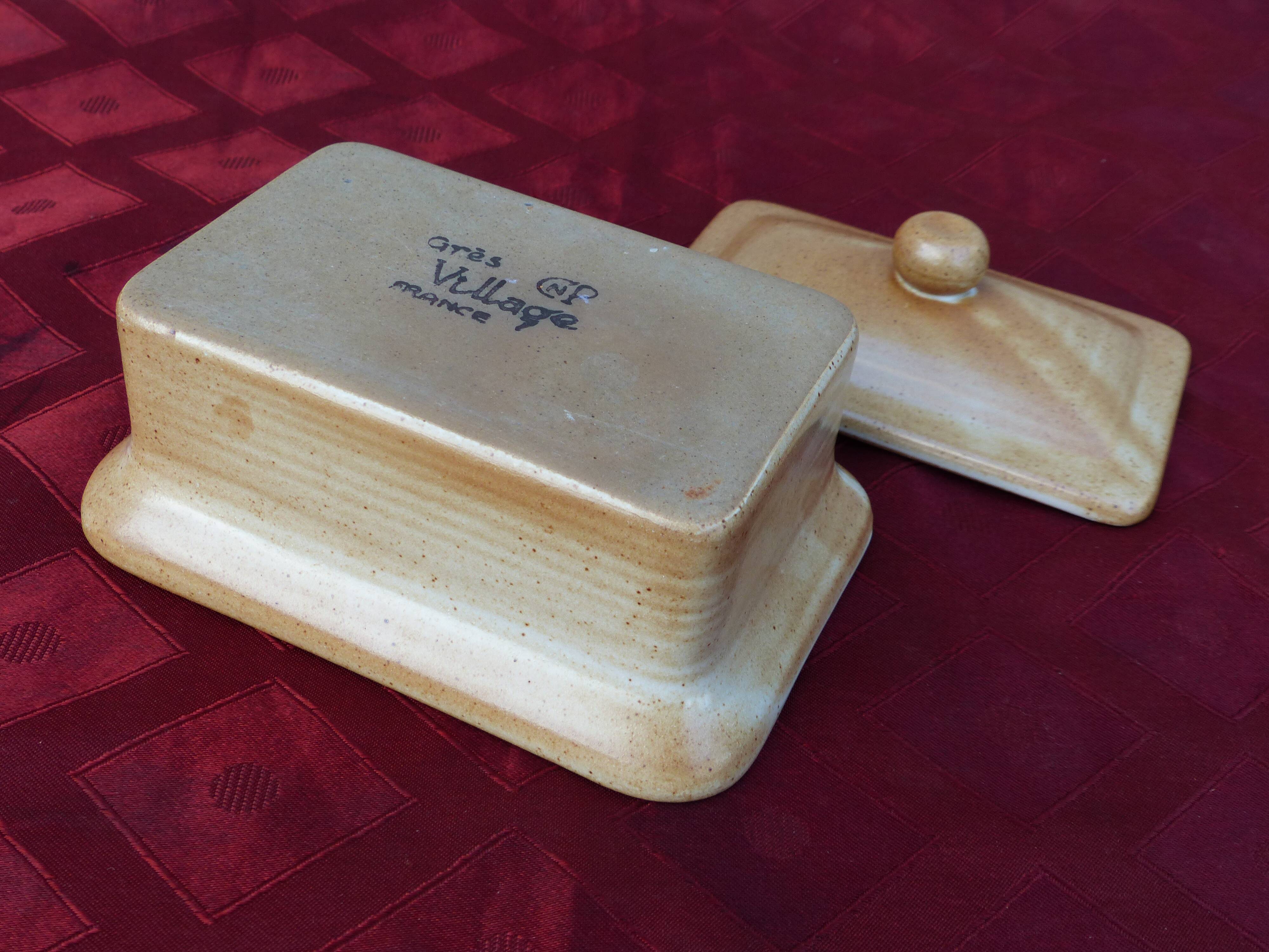 Butter maker in "sandstone village france"