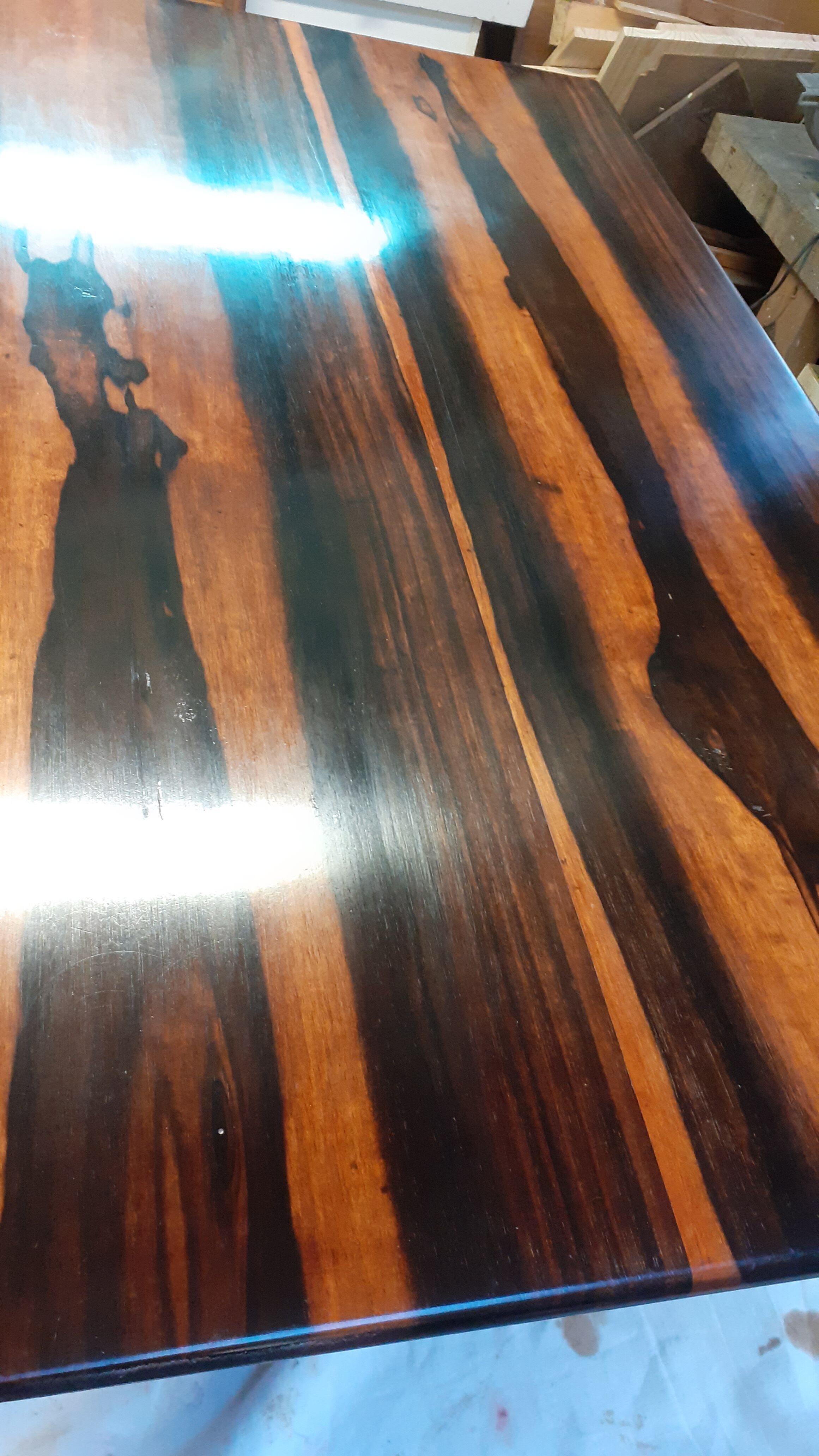 Coffee table in ebony from the 40s/50s