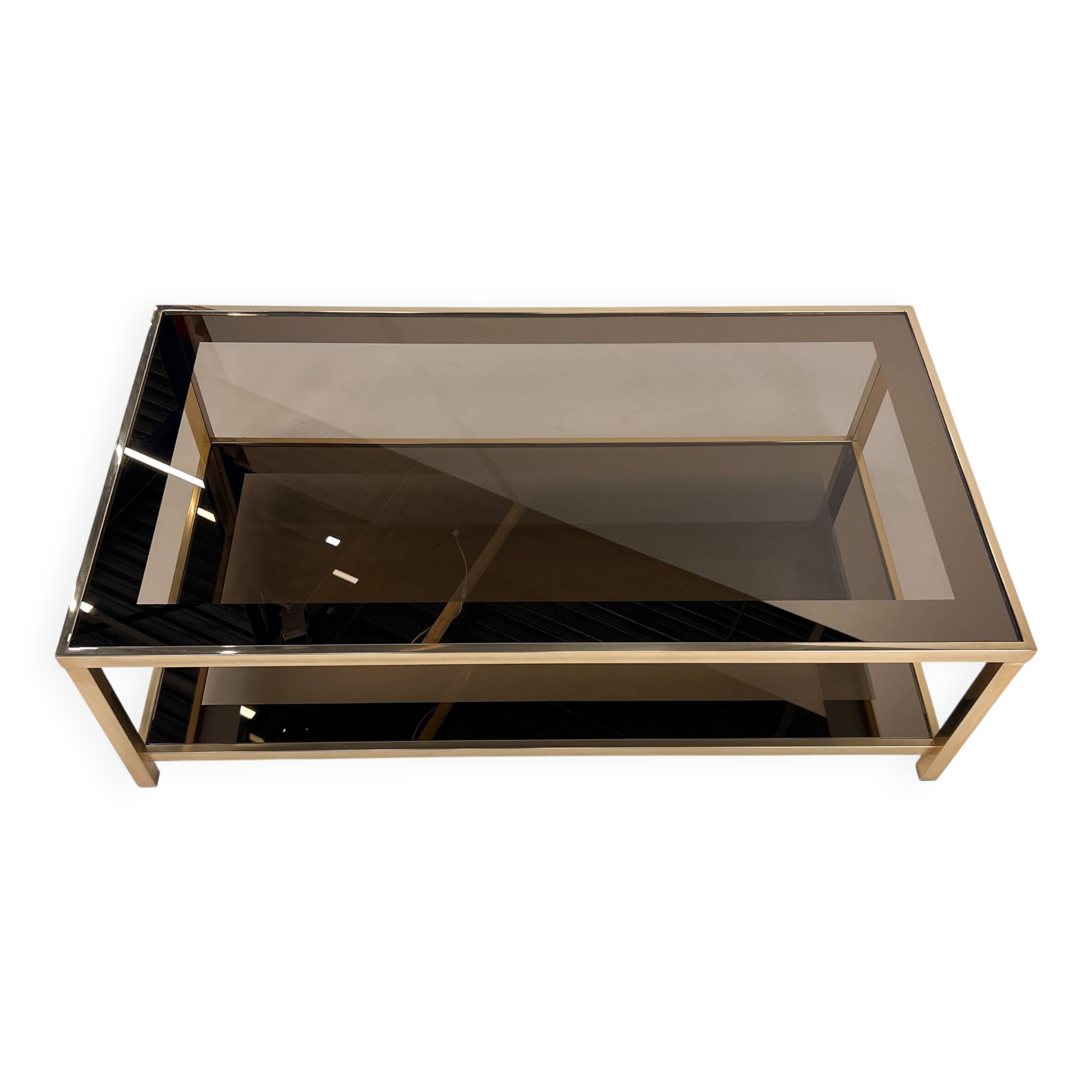 Belgo Chrome coffee table in brass and smoked mirror glass, 1970s.