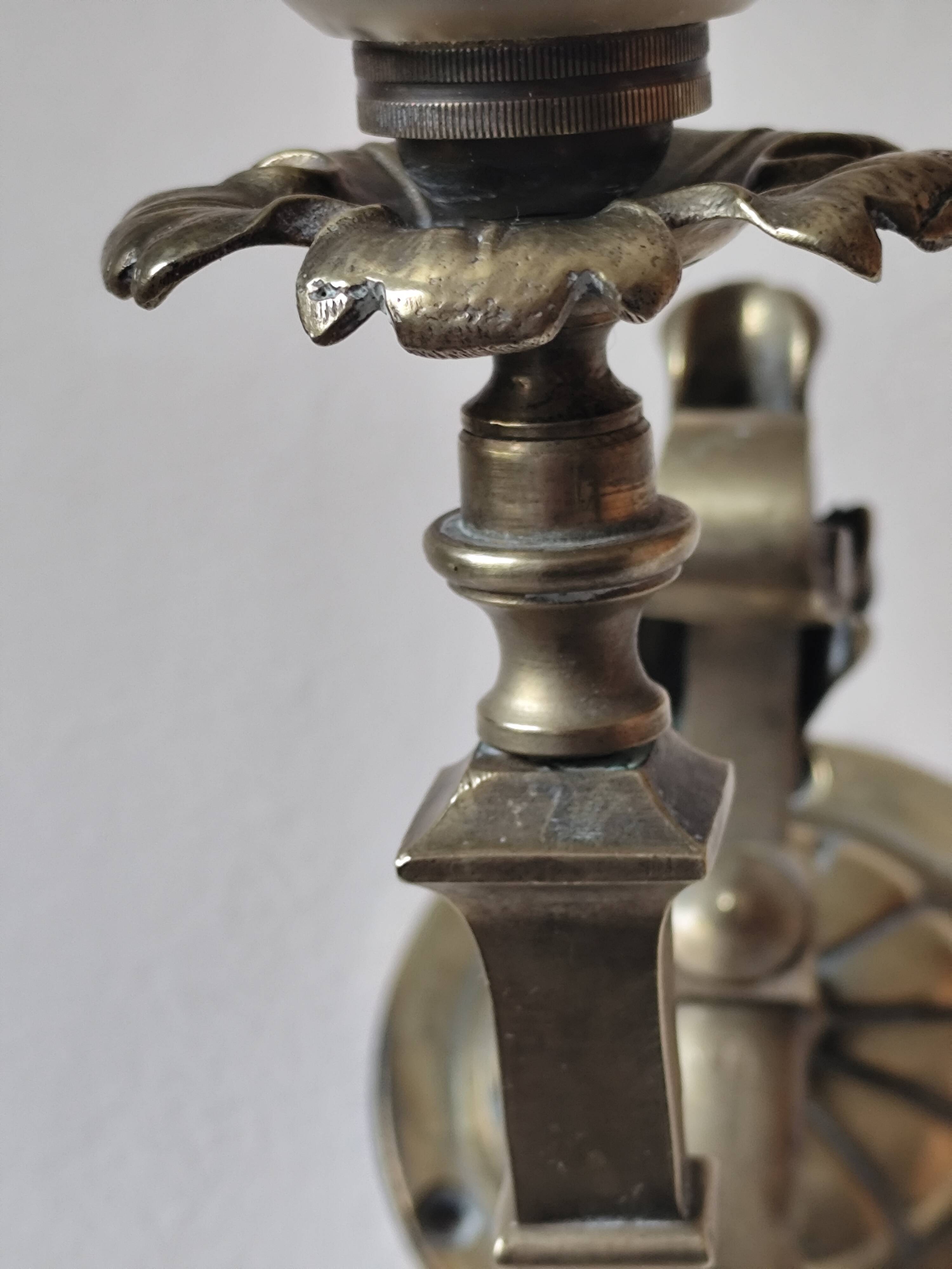 Bronze wall light with opaque glass tulip 1900