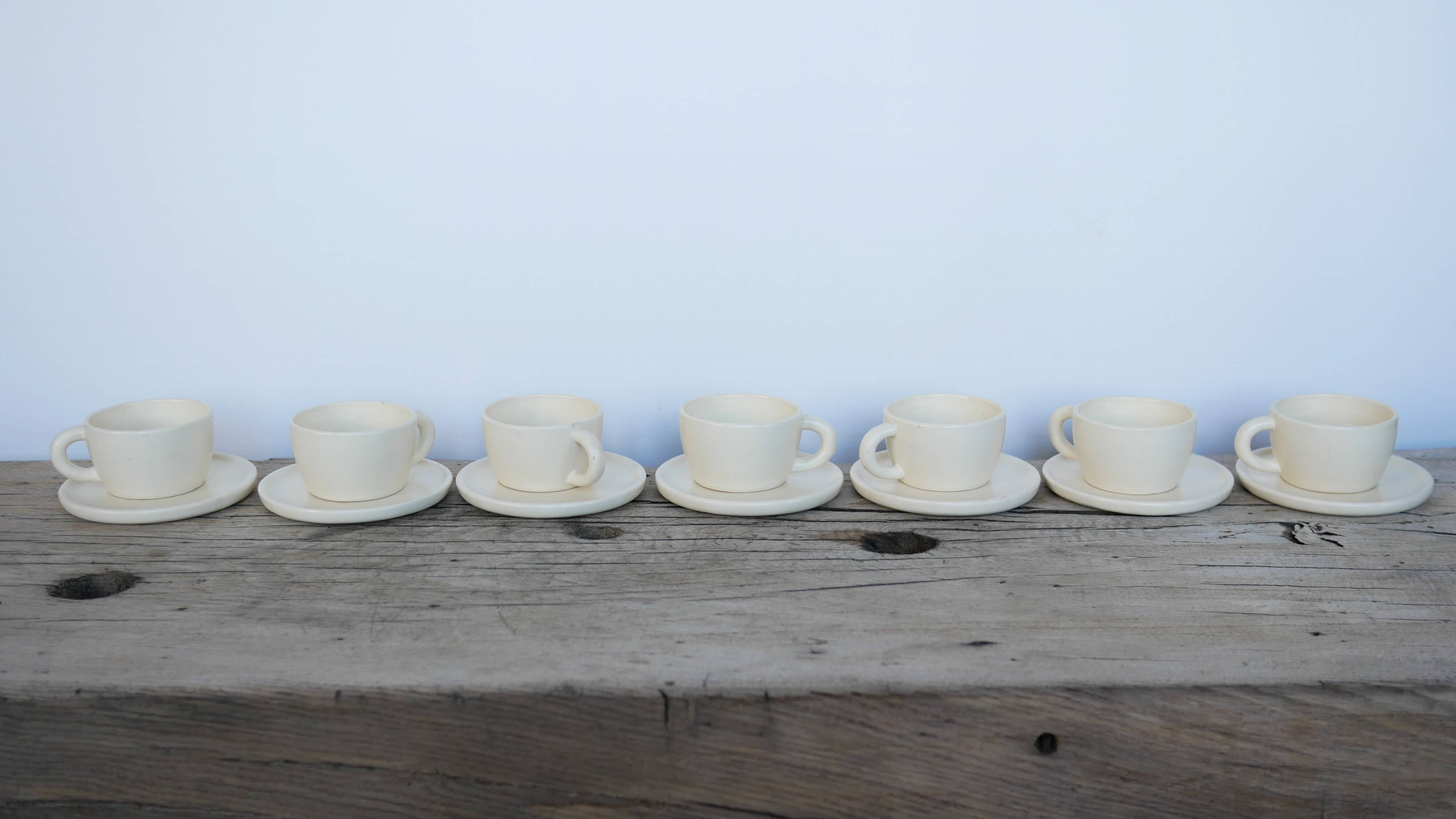 Series of 7 vintage ceramic cups and saucers by Le Pot de Terre