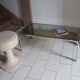 Table basse chrome et verre fumé