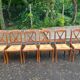 6 Directoire-style dining chairs in solid wood with rush seats from the 1960s.