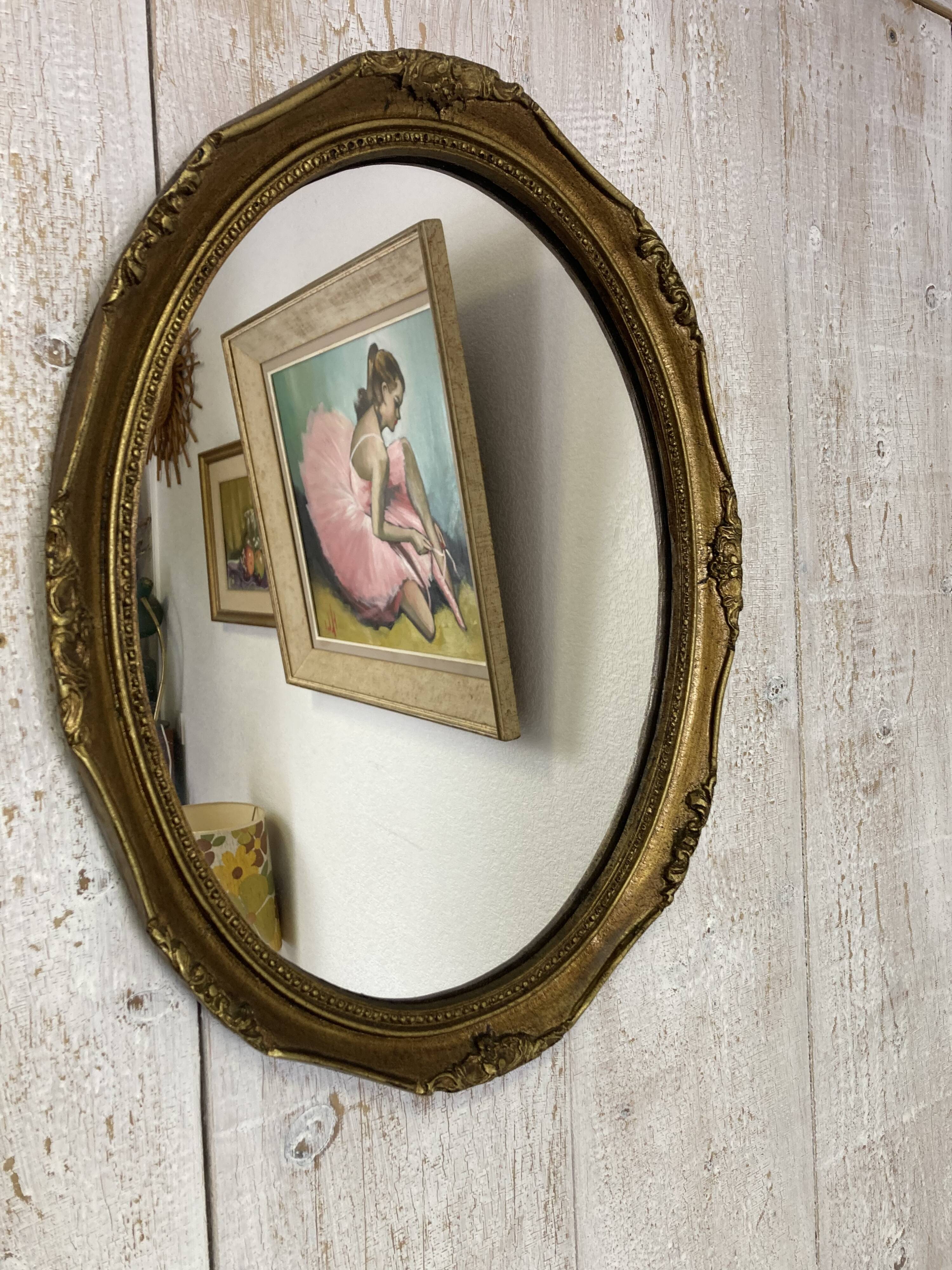 Antique oval mirror