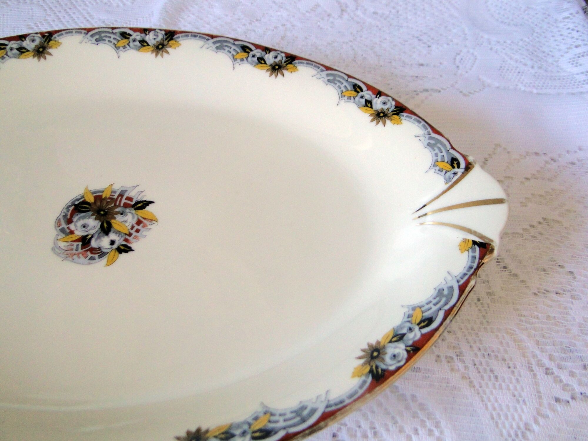 Large old oval dish in art deco porcelain