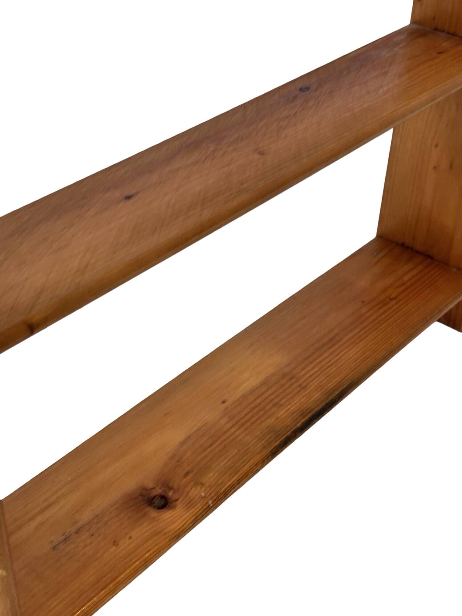 Vintage wooden wall shelve rack bookshelf in pinewood minimalist design