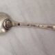 Solid silver spoon, neck brace